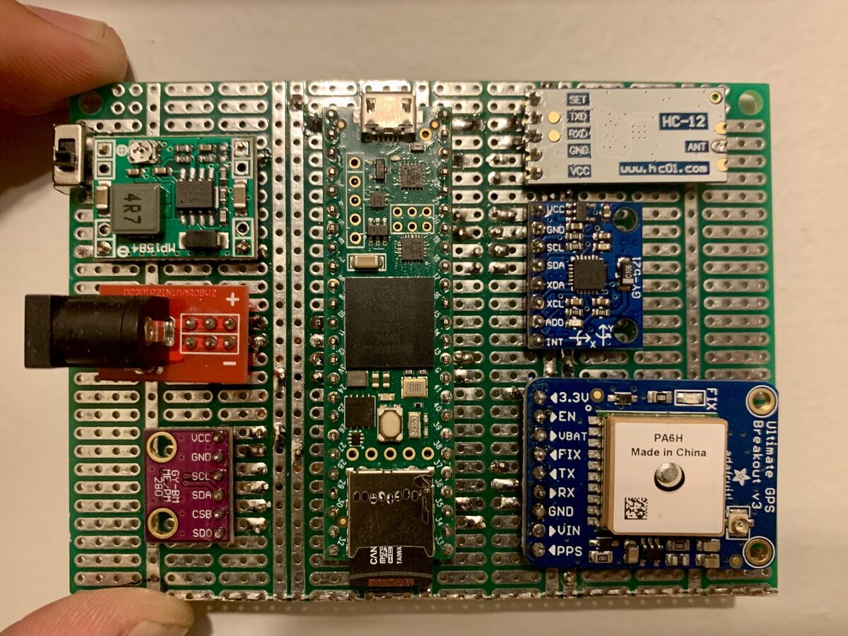 Flight computer with GPS and radio